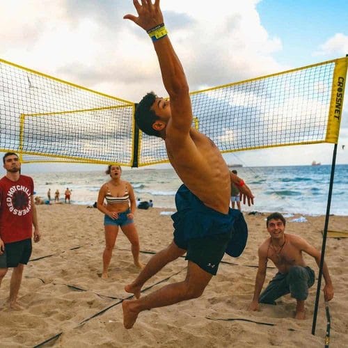 crossnet outdoor volleyball game beach action